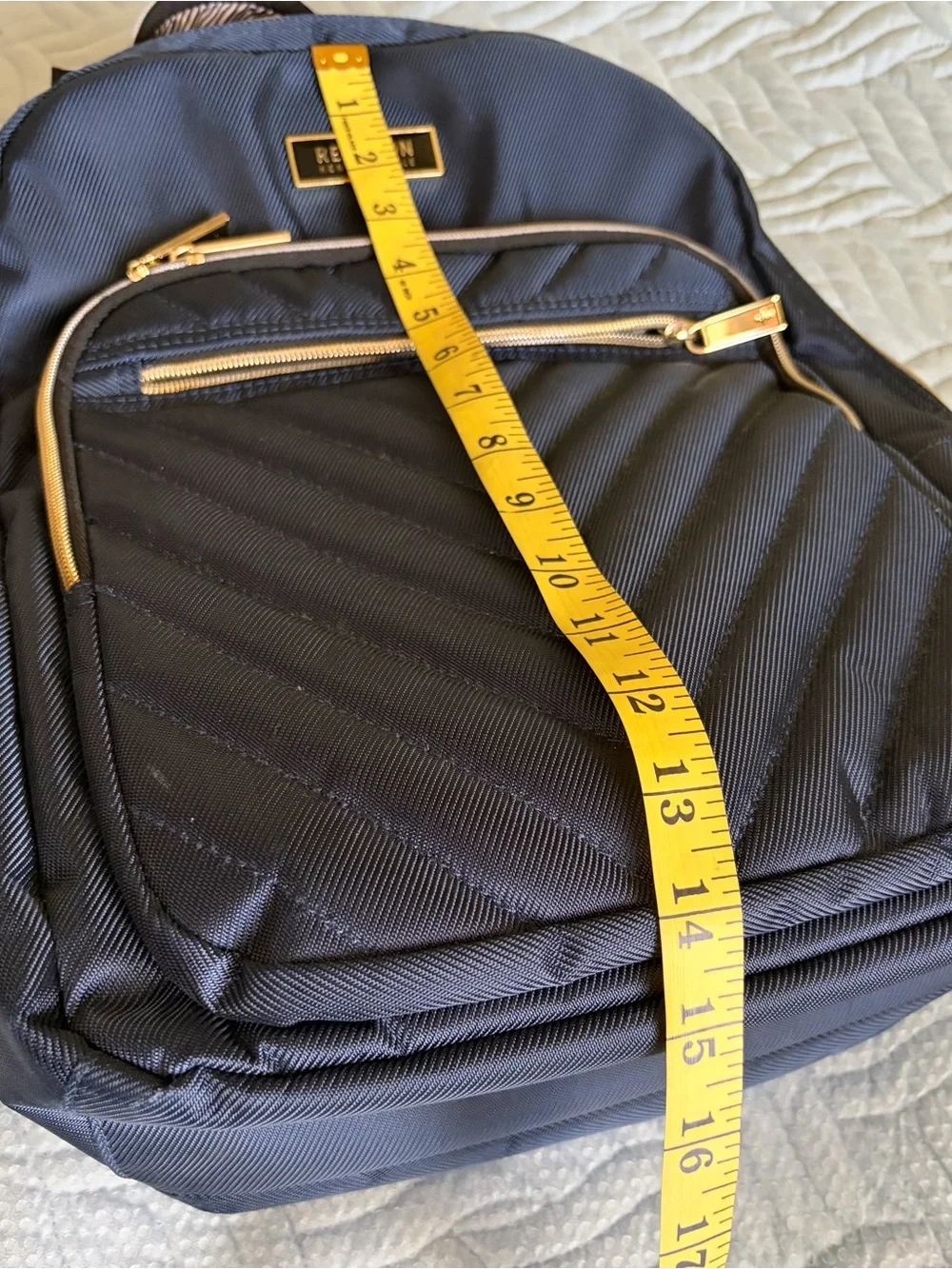 Kenneth Cole Reaction Quilted Navy Backpack with Gold Accents